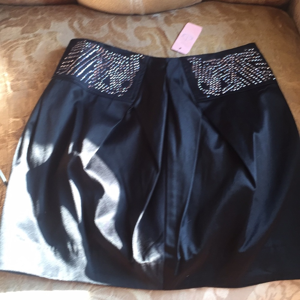 Satin Mini skirt with front rhinestones